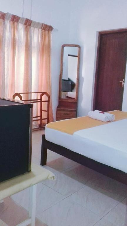 Postel nebo postele na pokoji v ubytování Villa DeLorenta