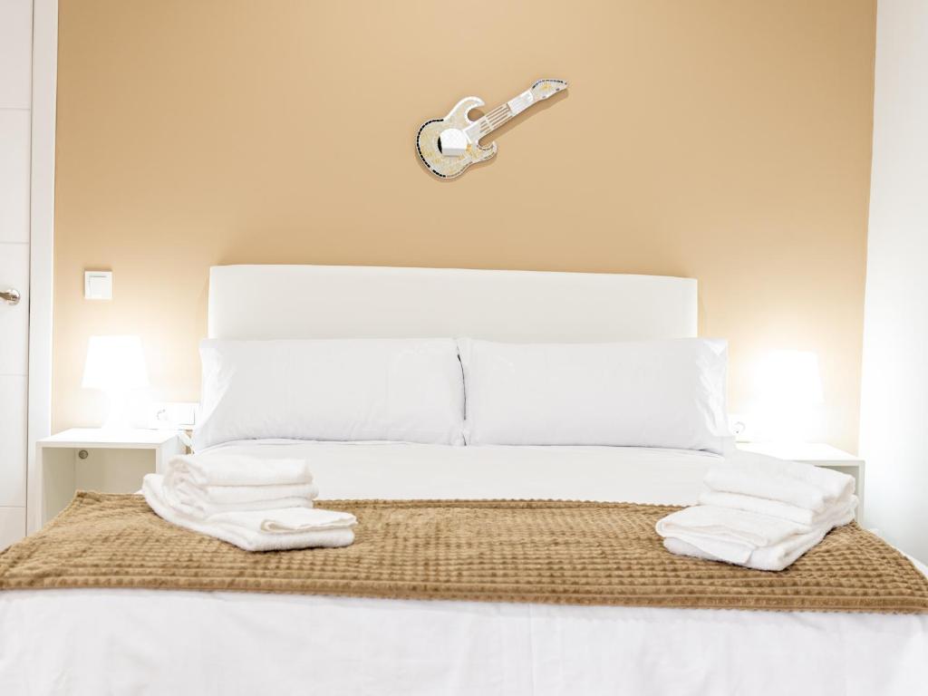 Posteľ alebo postele v izbe v ubytovaní Loft Capricho