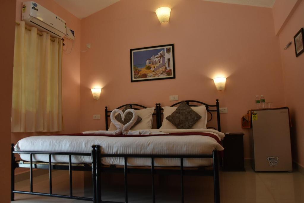 Postel nebo postele na pokoji v ubytování Hilias Retreat