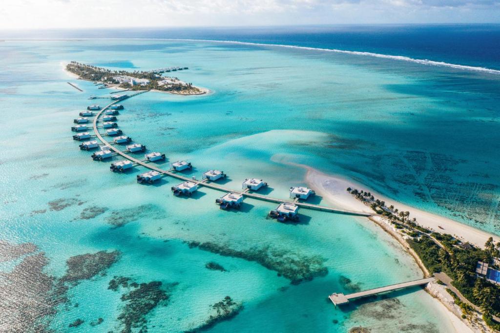 an aerial view of a resort in the ocean at Riu Palace Maldivas- All Inclusive in Dhaalu Atoll
