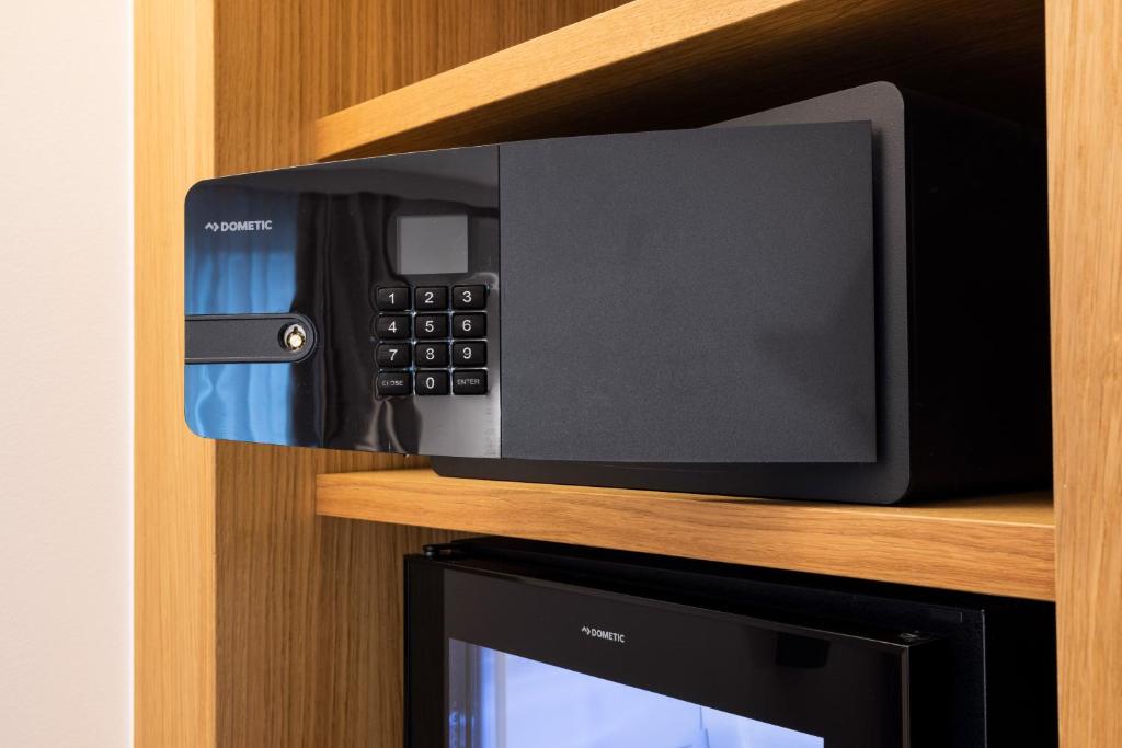 TV a/nebo společenská místnost v ubytování Fred Hotel Leonhardstrasse - Mobile Check-in