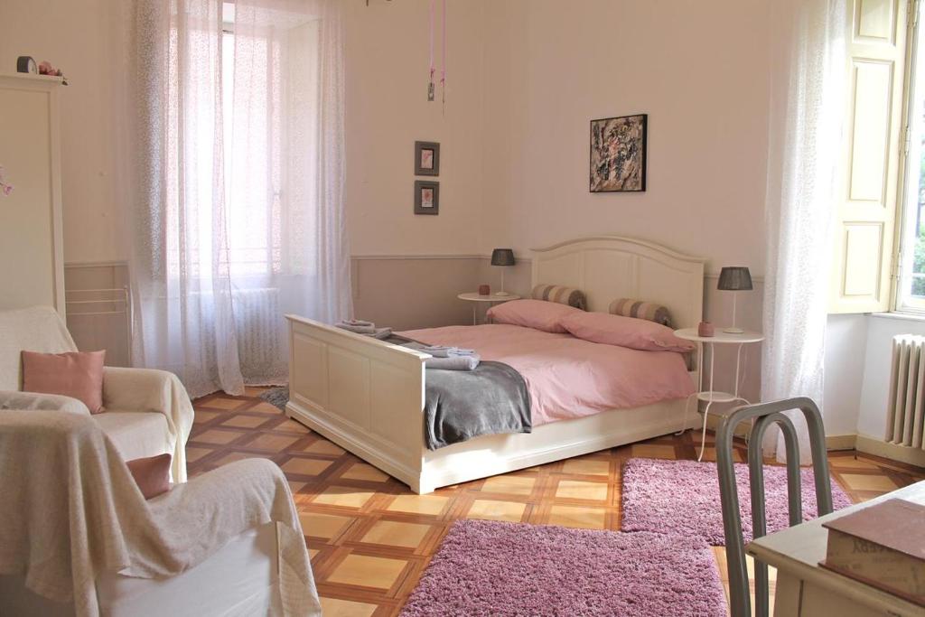 Säng eller sängar i ett rum på Bed & Blessing / Casa Borgo
