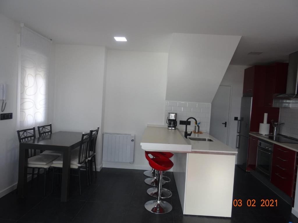 Kuchyň nebo kuchyňský kout v ubytování Apartamentos Casa Mucha