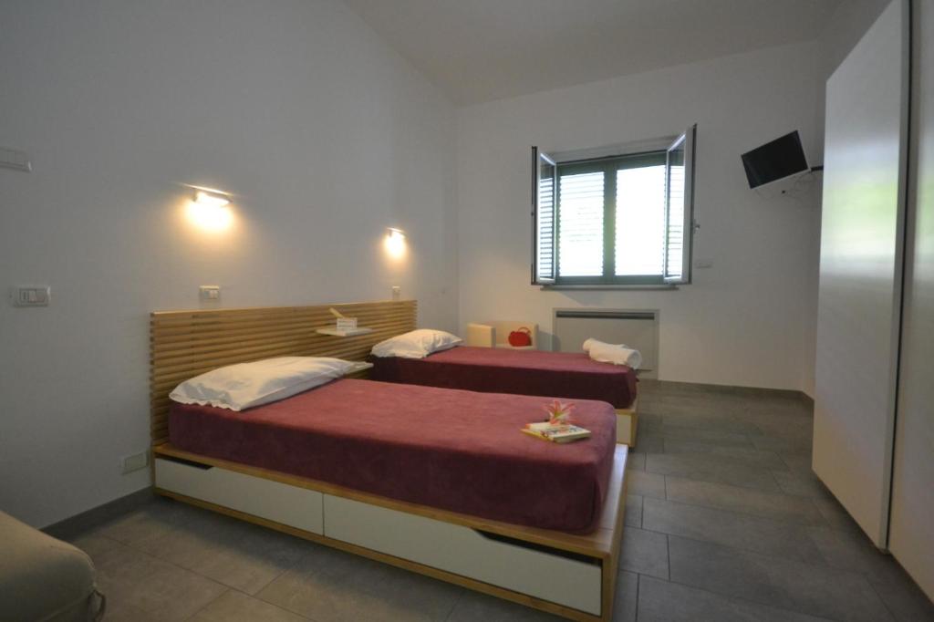 Postel nebo postele na pokoji v ubytování Punto di vista