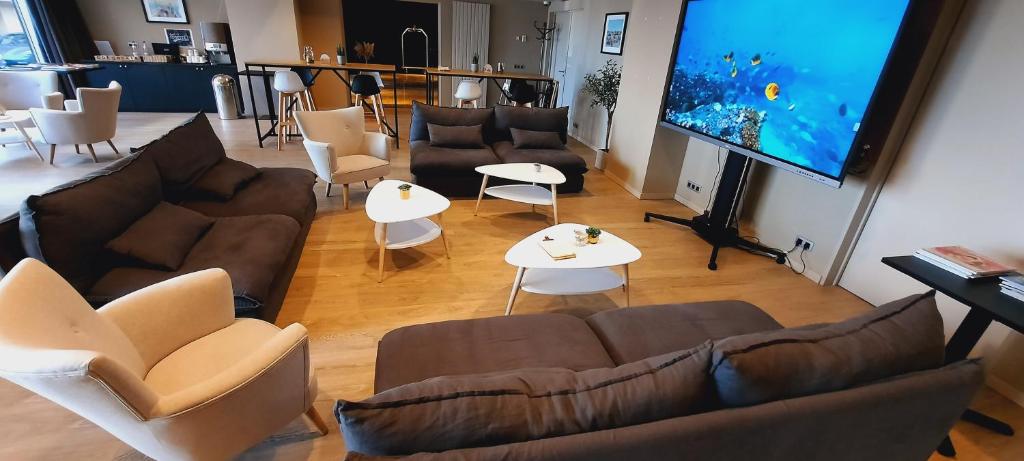 TV a/nebo společenská místnost v ubytování Hotel Bero