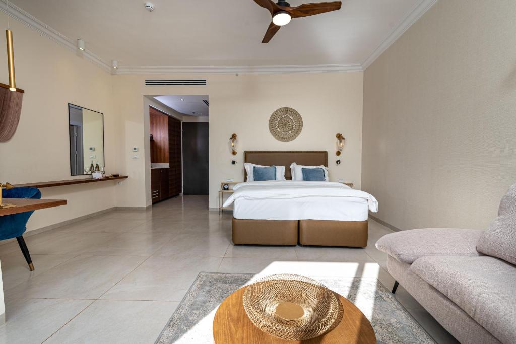 Postel nebo postele na pokoji v ubytování Amirey Hagalil Boutique Hotel
