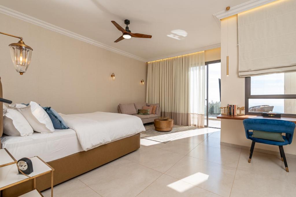Postel nebo postele na pokoji v ubytování Amirey Hagalil Boutique Hotel