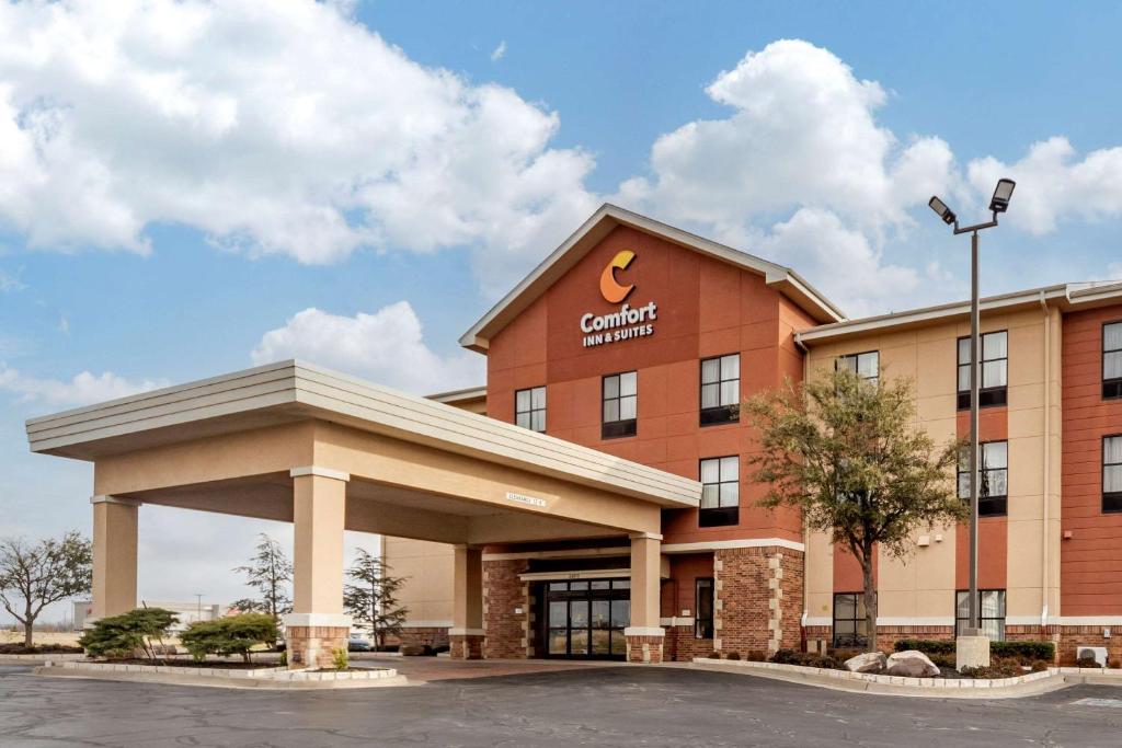 a rendering of the front of a cranberry hotel at Comfort Inn & Suites Shawnee North near I-40 in Shawnee