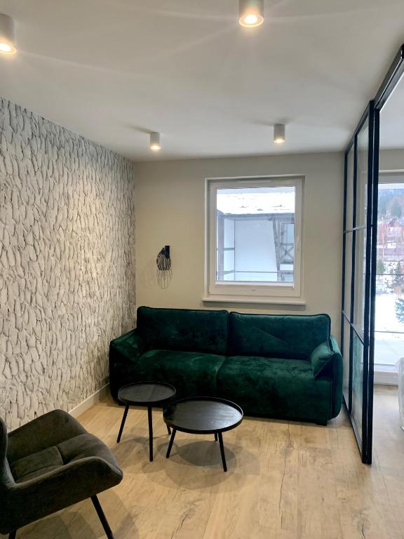 Posedenie v ubytovaní APARTAMENTY PIANO POLNA 28