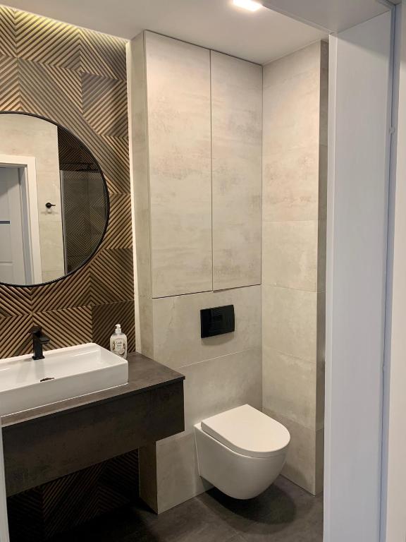 Kúpeľňa v ubytovaní APARTAMENTY PIANO POLNA 28