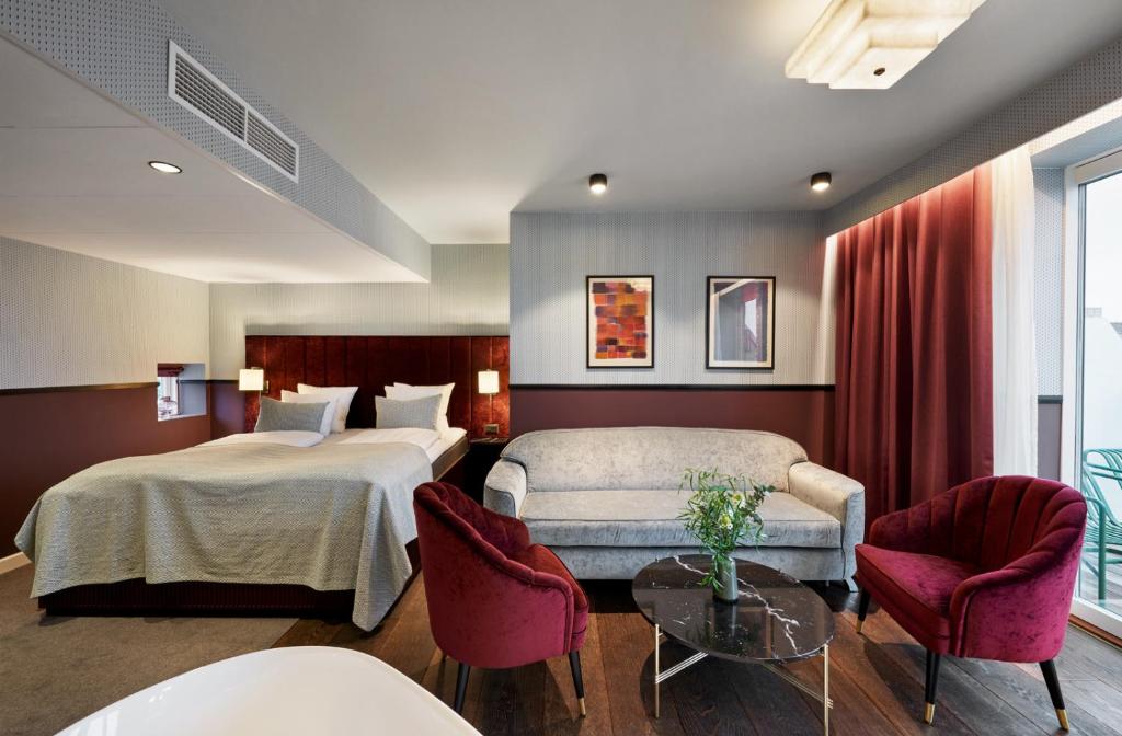 Postel nebo postele na pokoji v ubytování WIDE Hotel