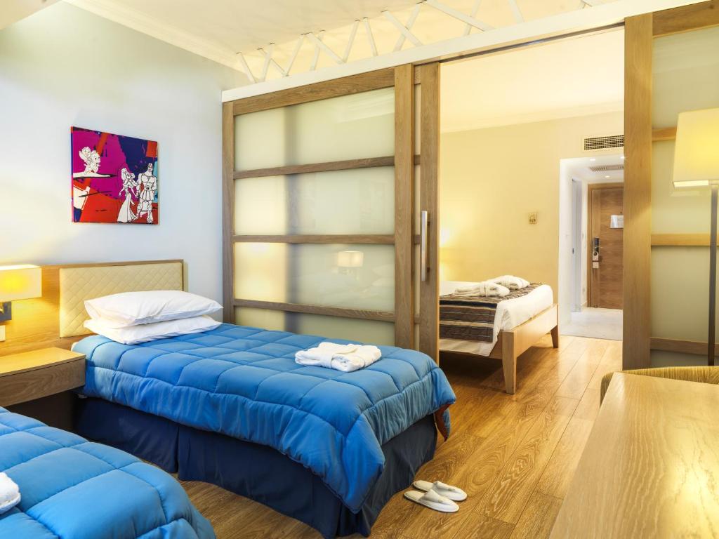 Olympic Lagoon Resort Paphos - Family Junior Suite With Inland View
