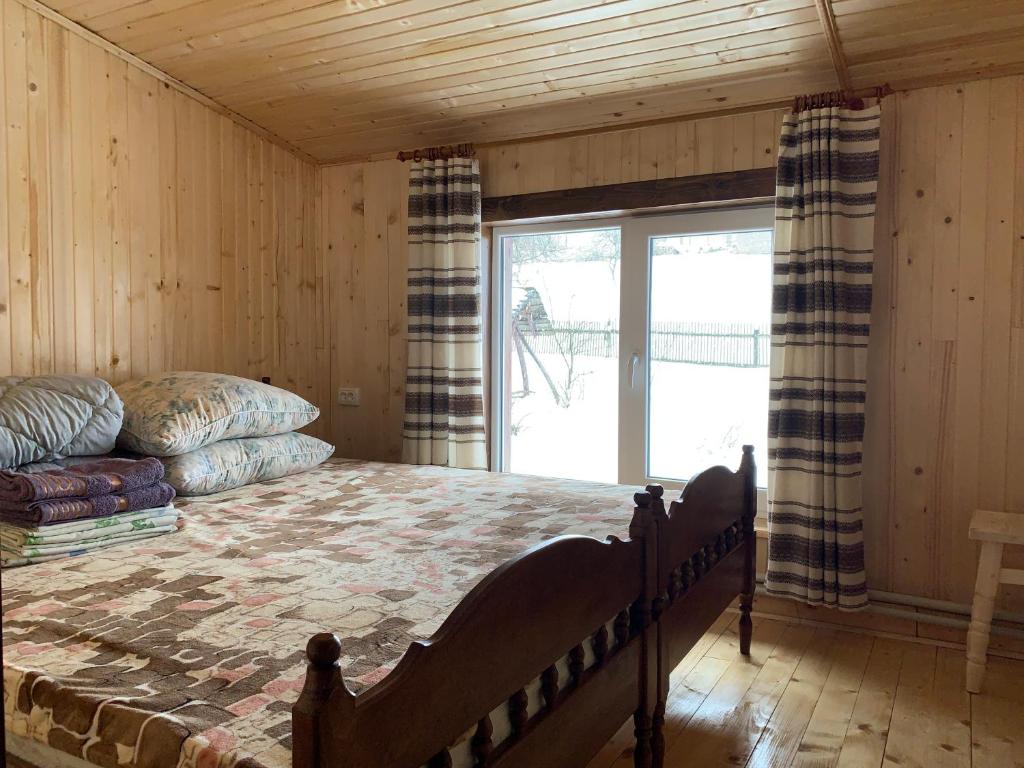 Postel nebo postele na pokoji v ubytování Подина