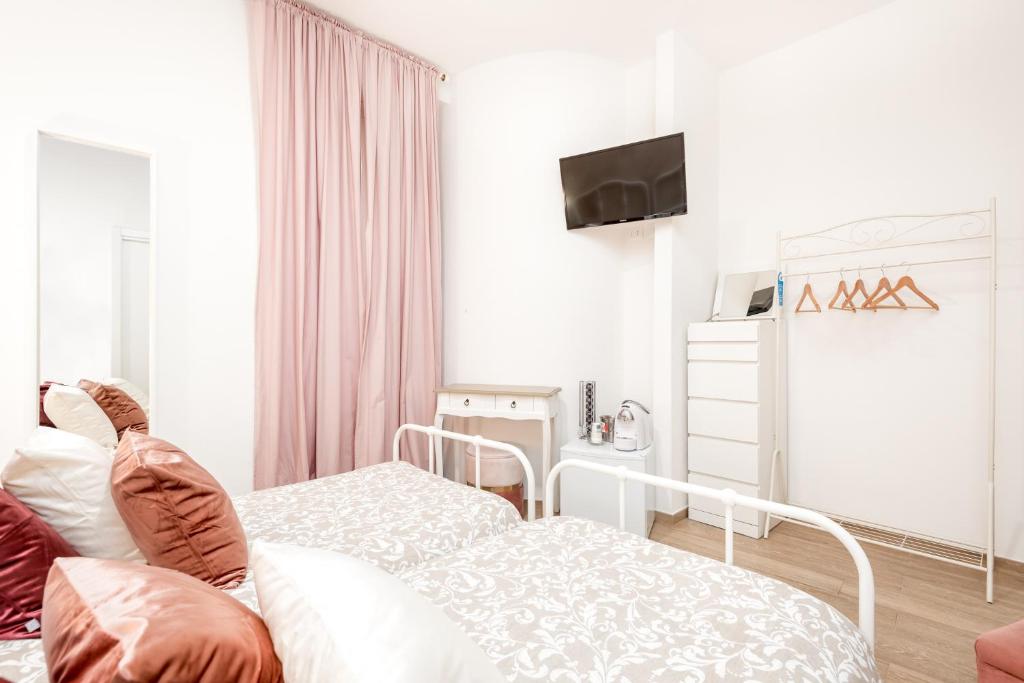 Posteľ alebo postele v izbe v ubytovaní Le camere di Nathan