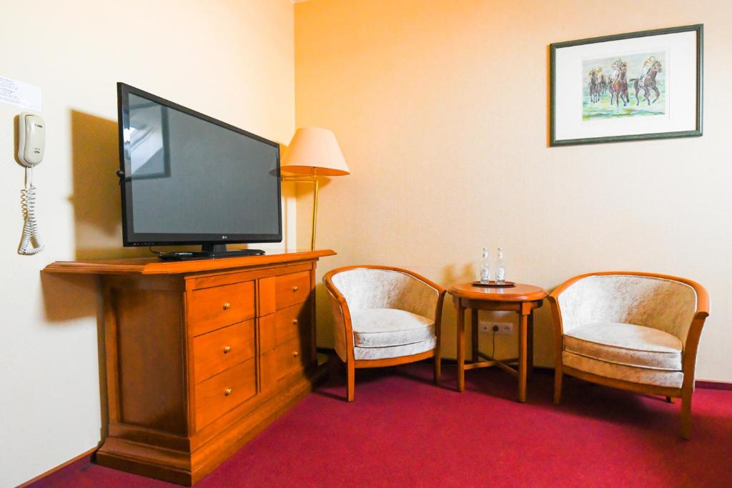 Telewizja i/lub zestaw kina domowego w obiekcie Pensjonat Fitness & Spa Gregor