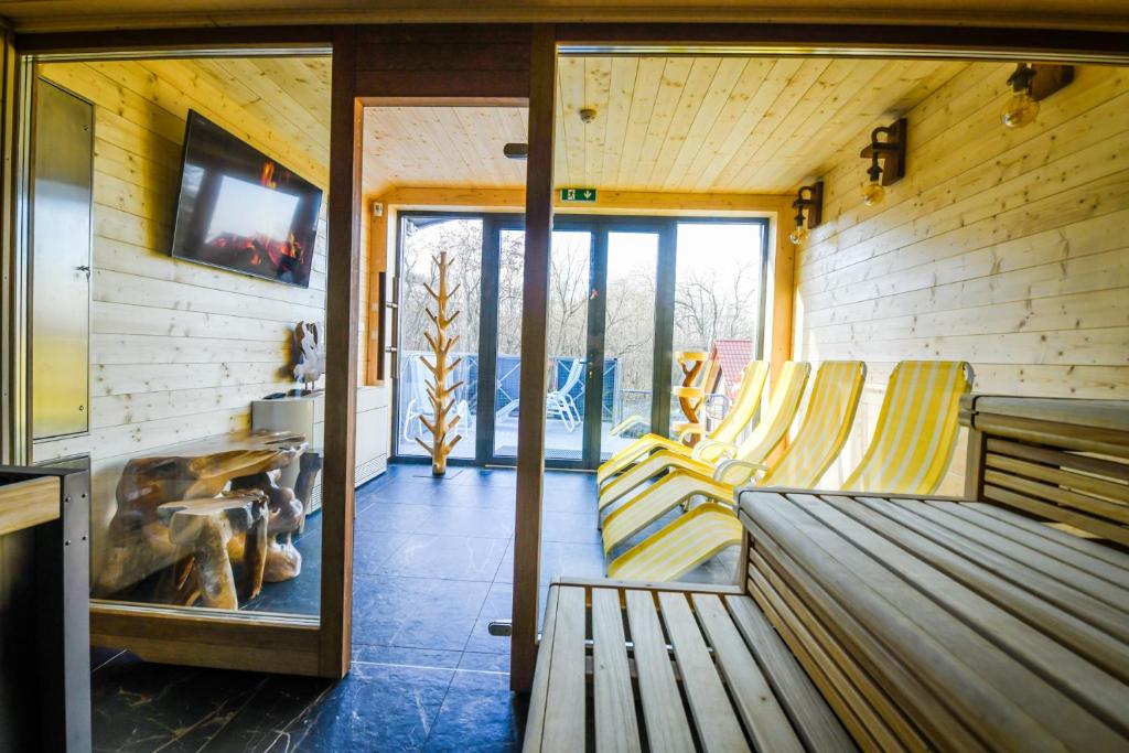 Telewizja i/lub zestaw kina domowego w obiekcie Pensjonat Fitness & Spa Gregor