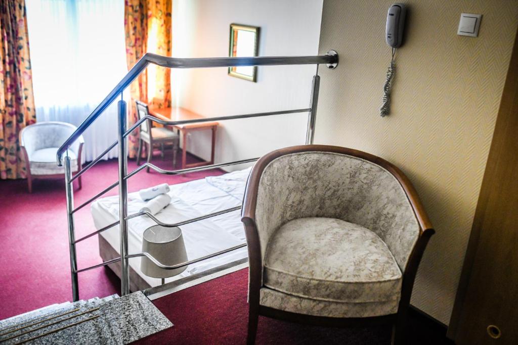 Łóżko lub łóżka w pokoju w obiekcie Pensjonat Fitness & Spa Gregor