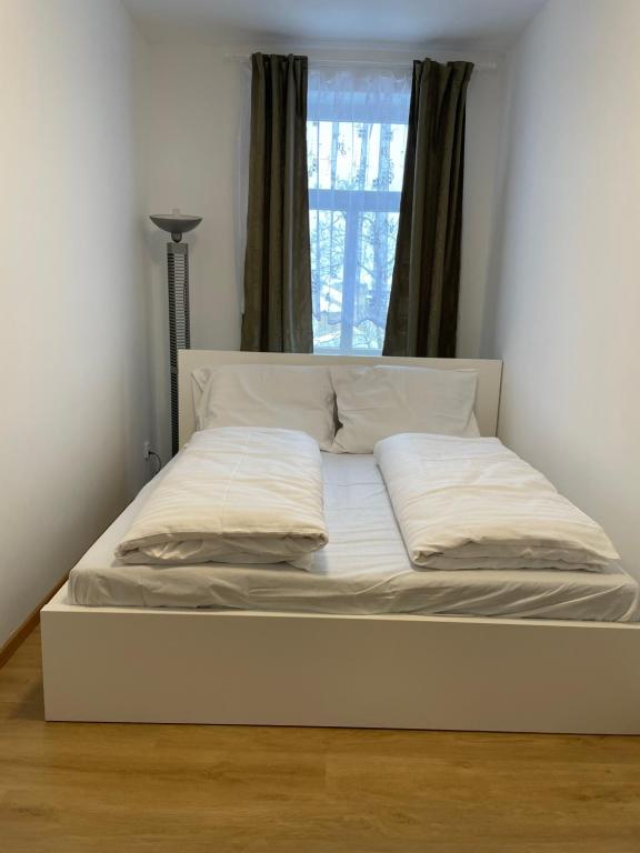 Postel nebo postele na pokoji v ubytování Apartmant T&T
