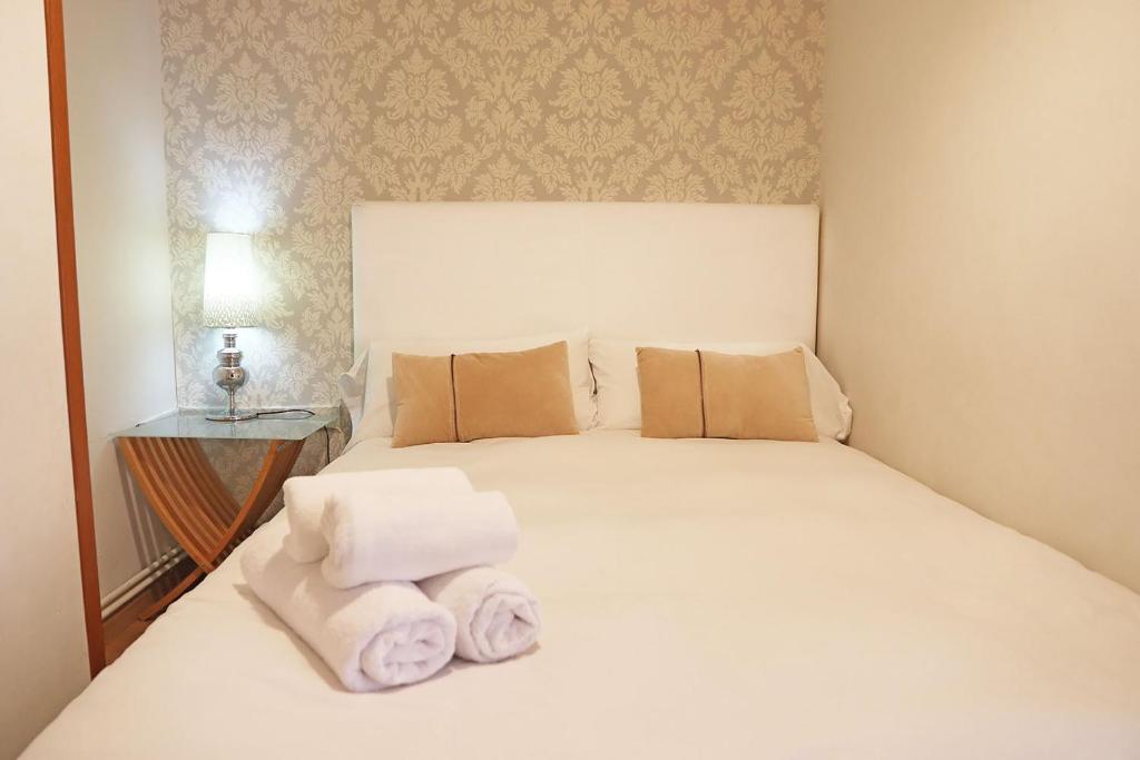 Posteľ alebo postele v izbe v ubytovaní Bcn-rentals apartments in the Old town