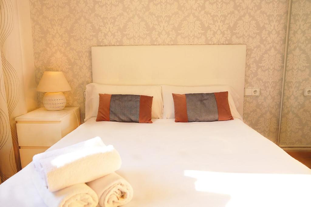Posteľ alebo postele v izbe v ubytovaní Bcn-rentals apartments in the Old town