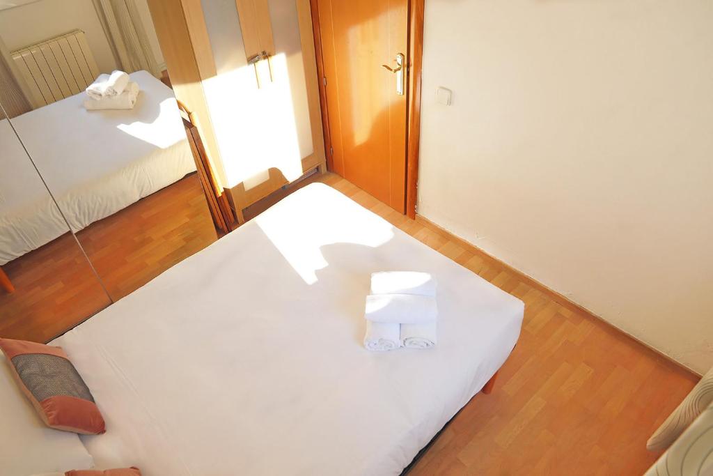 Posteľ alebo postele v izbe v ubytovaní Bcn-rentals apartments in the Old town