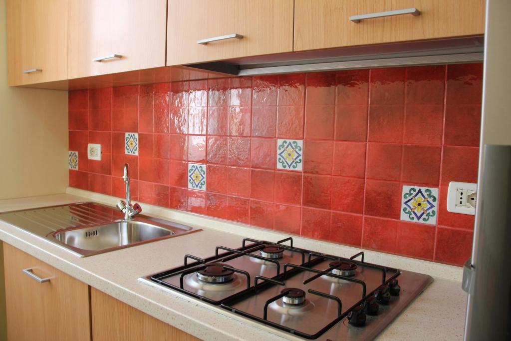 Kuchyň nebo kuchyňský kout v ubytování B&B Trapani Bedda