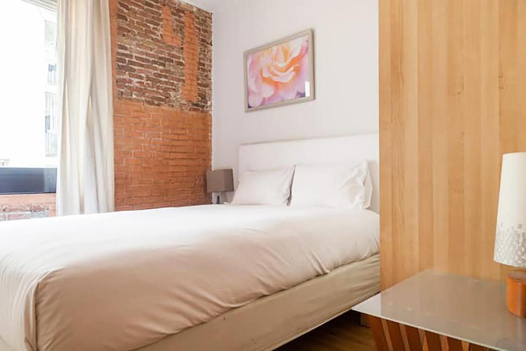 Posteľ alebo postele v izbe v ubytovaní Bcn-rentals apartments in the Old town