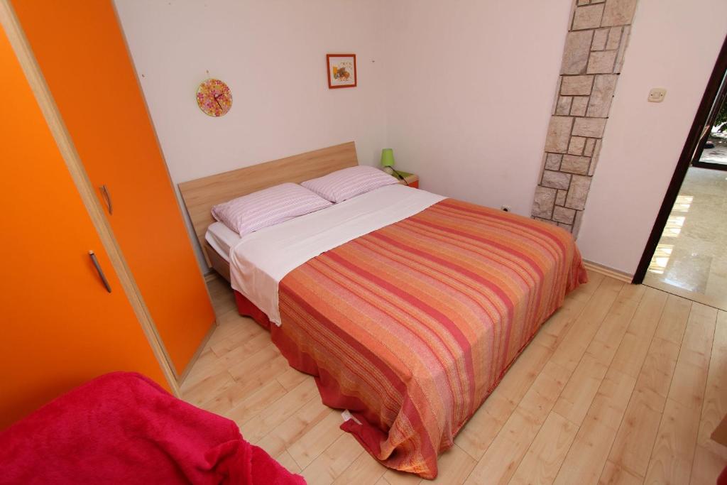 Posteľ alebo postele v izbe v ubytovaní Apartments Lara