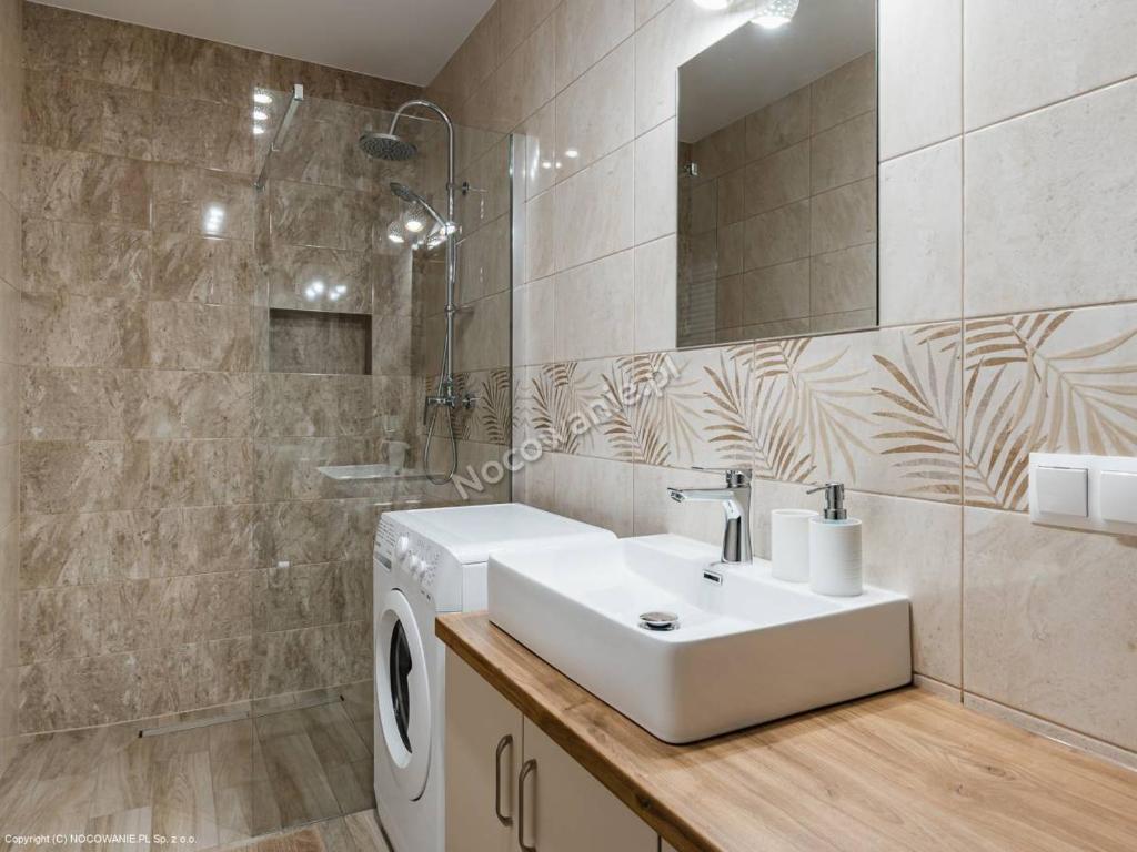 Kúpeľňa v ubytovaní Apartamenty Nad Rzeką