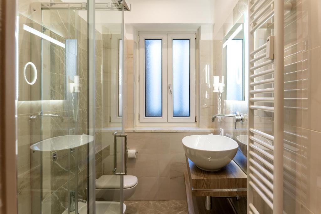 Koupelna v ubytování Hotel Victoria