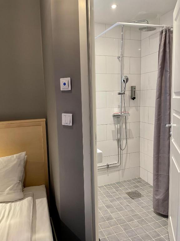 Koupelna v ubytování Unique Hotel