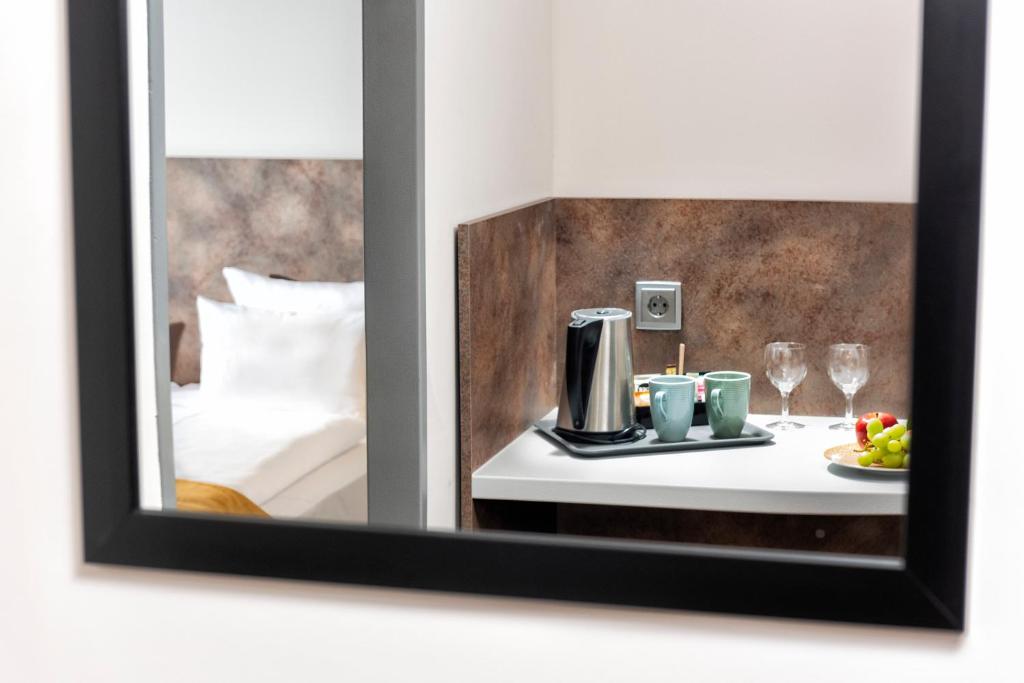Postel nebo postele na pokoji v ubytování SORAT Hotel Berlin