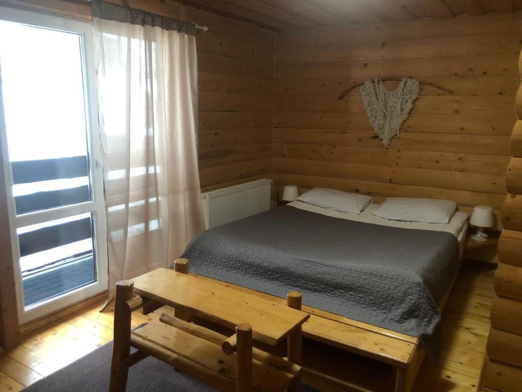 Una cama o camas en una habitación de Круассан