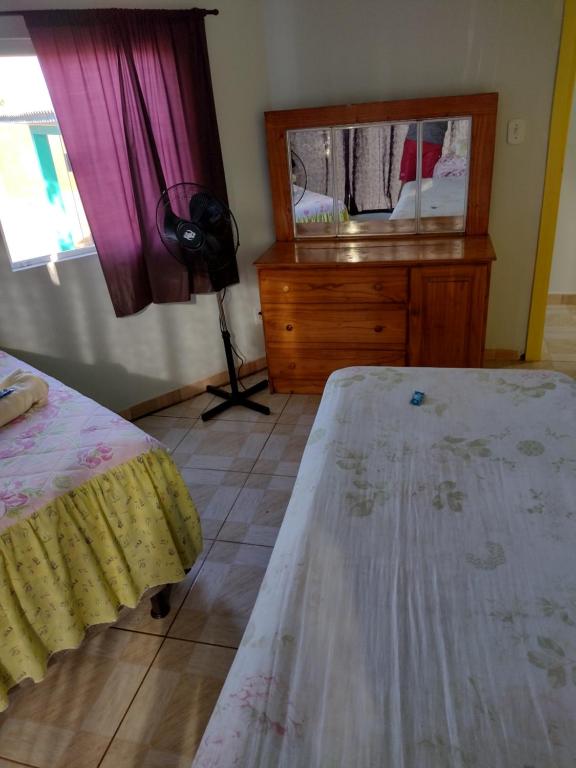 Postel nebo postele na pokoji v ubytování Pousada Shalom