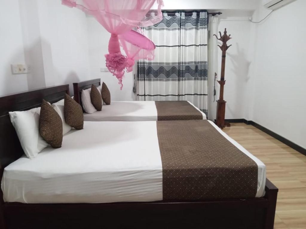 Postel nebo postele na pokoji v ubytování Holiday Villa