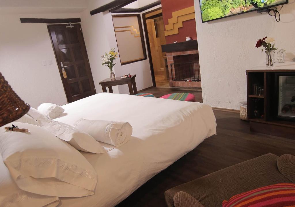 Letto o letti in una camera di Hatun Inti Boutique