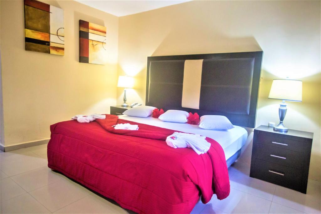 Postel nebo postele na pokoji v ubytování Hotel Plaza Mirador