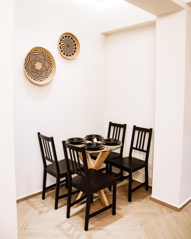Posedenie v ubytovaní Syvota Apartments Family