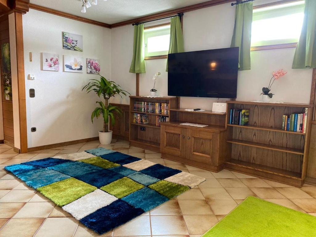 TV a/nebo společenská místnost v ubytování Ferienwohnung Scheiblechner