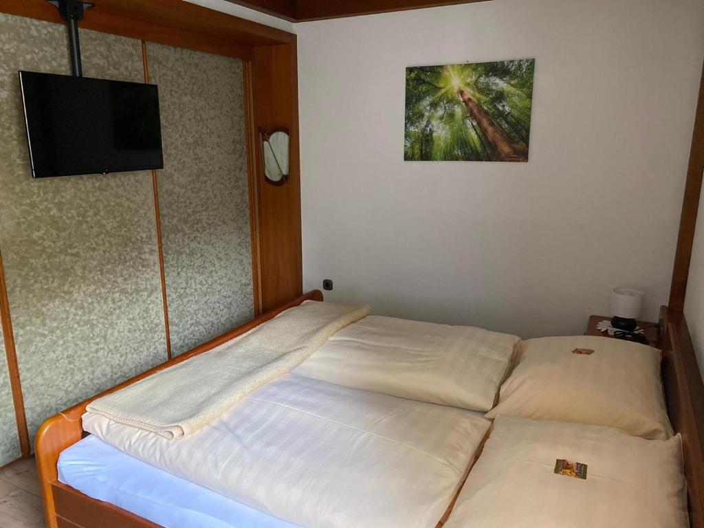 Postel nebo postele na pokoji v ubytování Ferienwohnung Scheiblechner