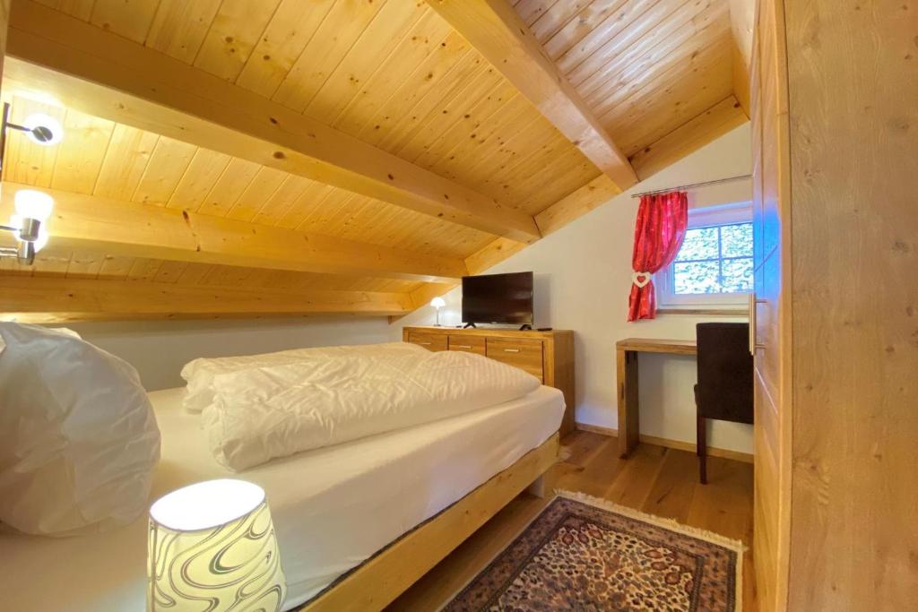 Postel nebo postele na pokoji v ubytování Chalet Salzburg, Dienten