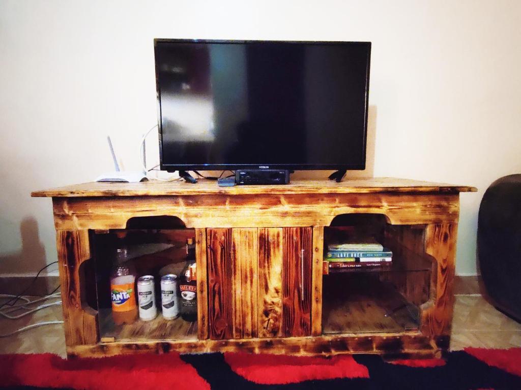 TV a/nebo společenská místnost v ubytování Ella's Haven