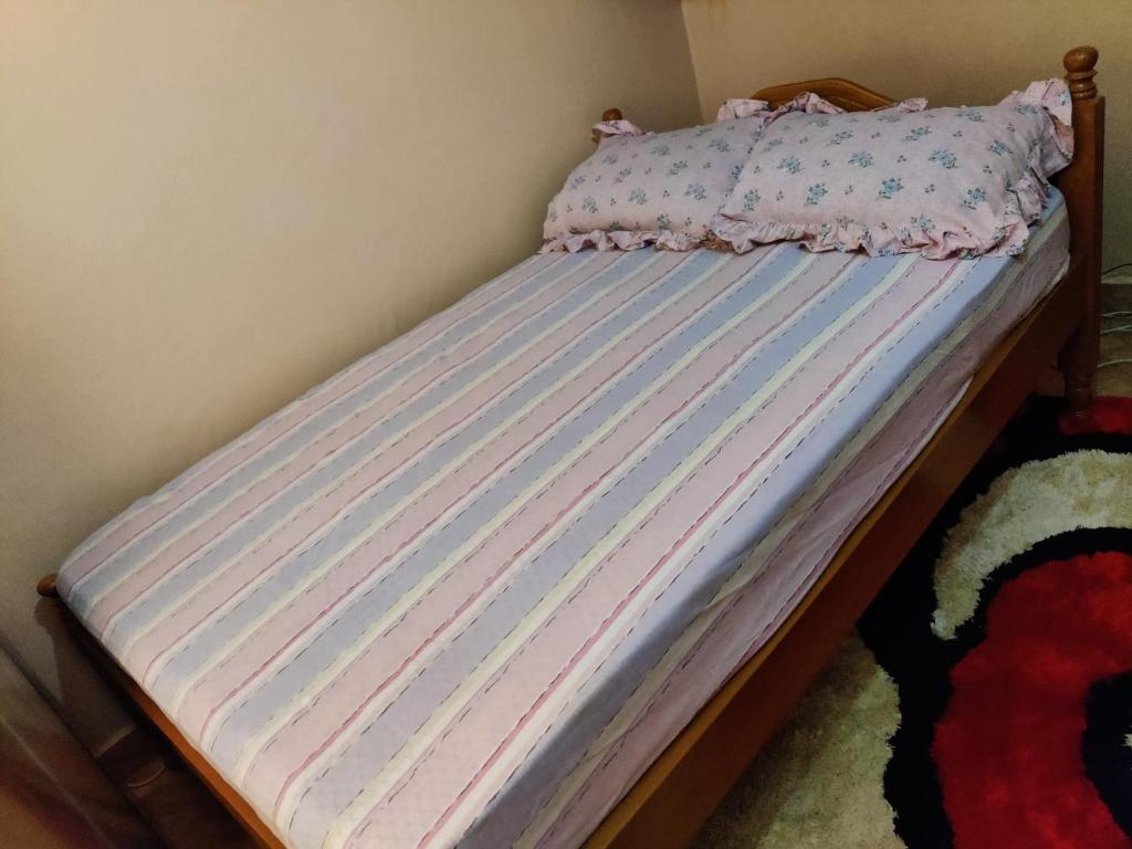 Postel nebo postele na pokoji v ubytování Ella's Haven