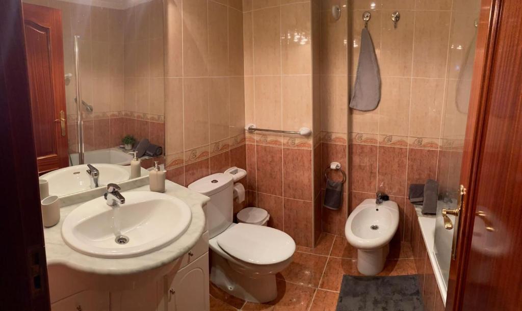 Koupelna v ubytování PISO VOLVORETA