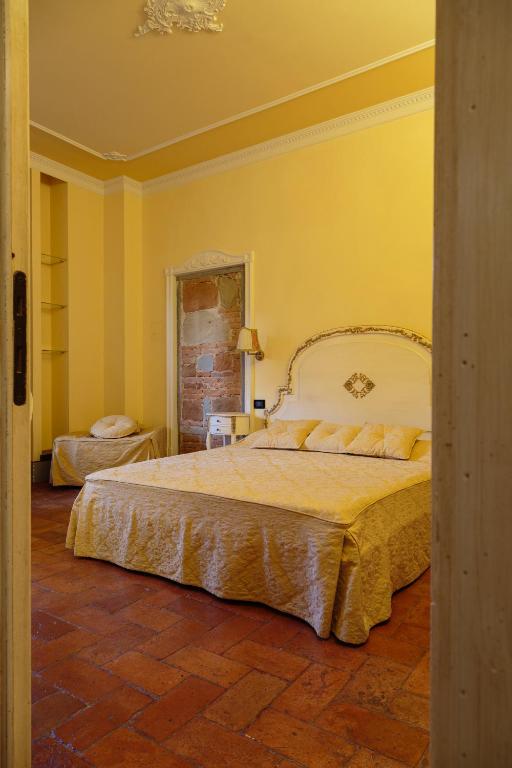 Posteľ alebo postele v izbe v ubytovaní Casa Leopardi