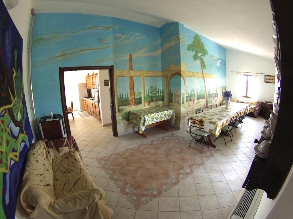 Postel nebo postele na pokoji v ubytování B&B Su Tintillu