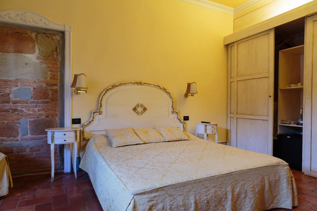 Posteľ alebo postele v izbe v ubytovaní Casa Leopardi