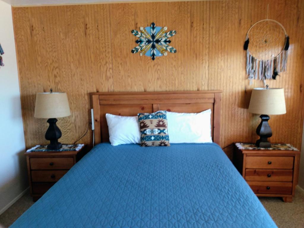 Postel nebo postele na pokoji v ubytování Mokee Motel