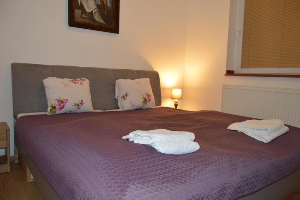 Letto o letti in una camera di Bohemica Apartman 3