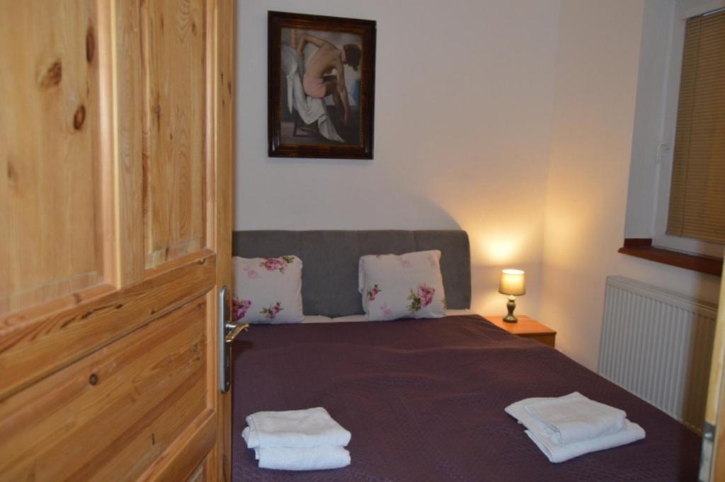 Letto o letti in una camera di Bohemica Apartman 3